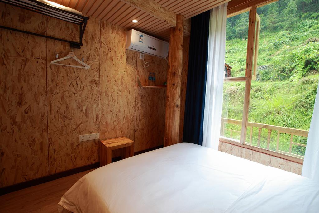 Tong Sang Art Hotel Liping Zimmer foto