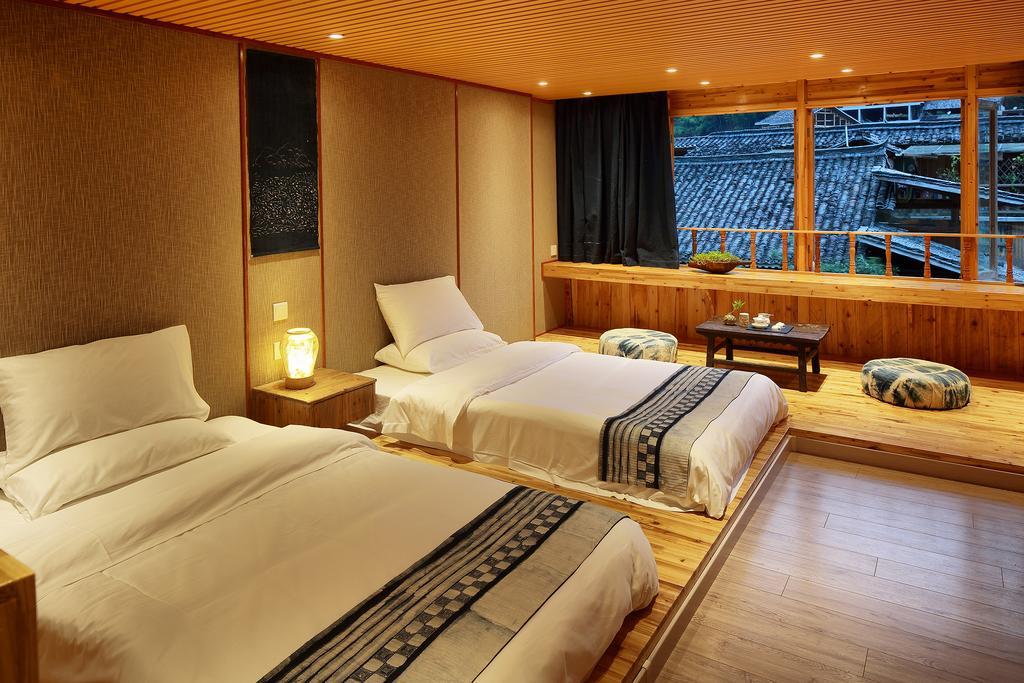 Tong Sang Art Hotel Liping Exterior foto